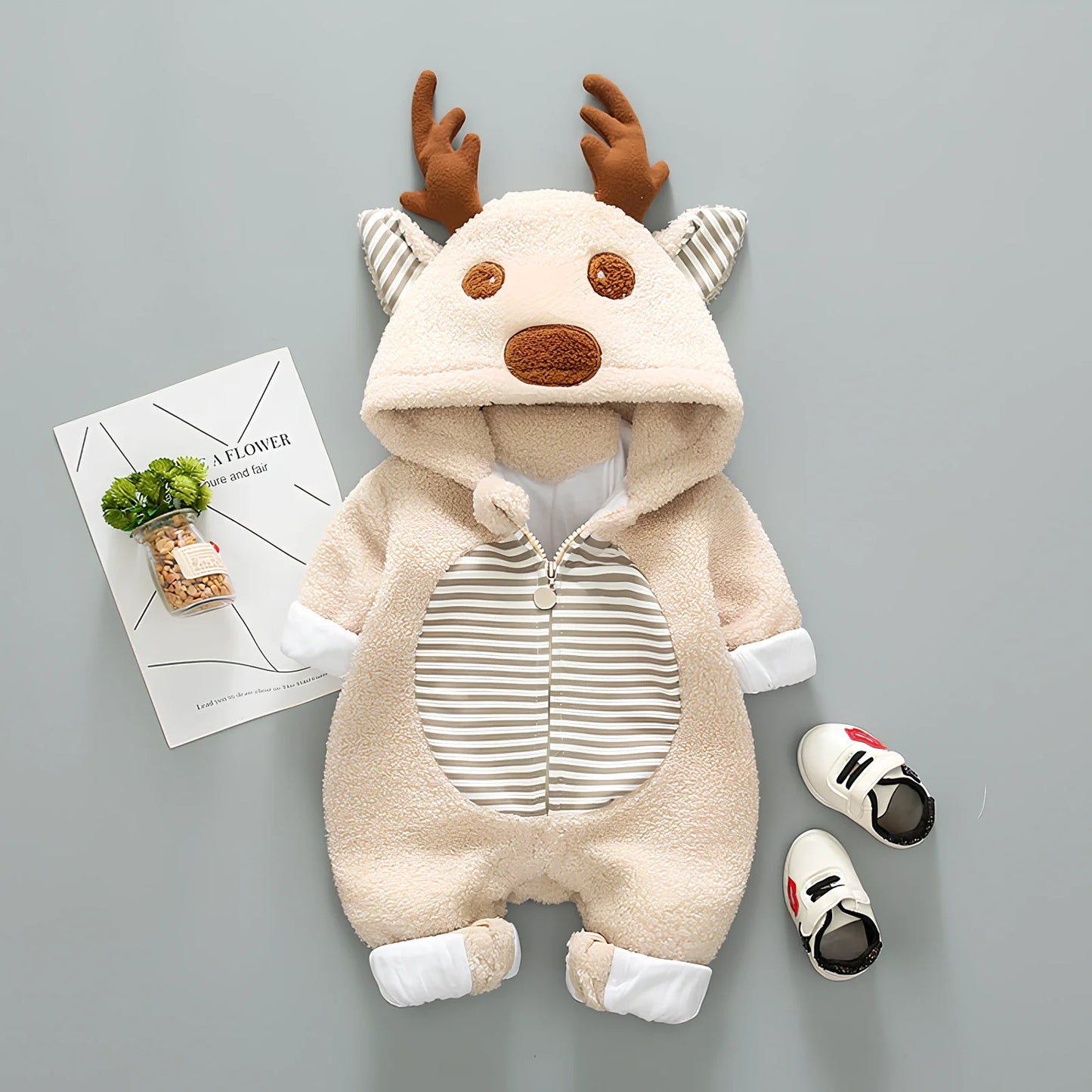 Baby wearing cotton romper with lace-up straps in khaki colour, size 80cm