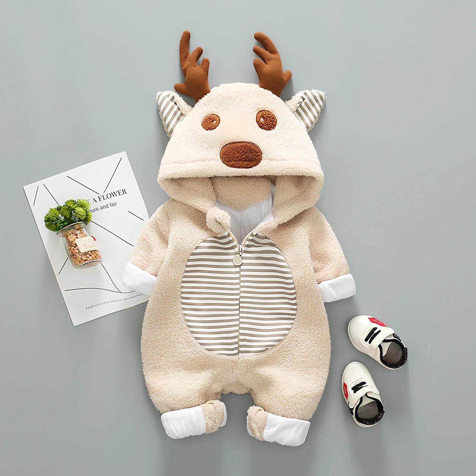 Baby wearing cotton romper with lace-up straps in khaki colour, size 80cm