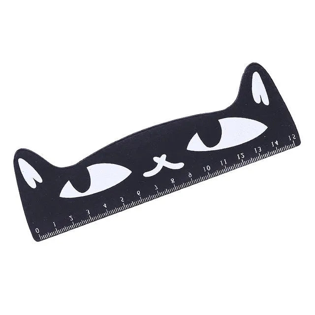 Creative cat-shaped wooden ruler measuring 13 cm in pink colour on white background