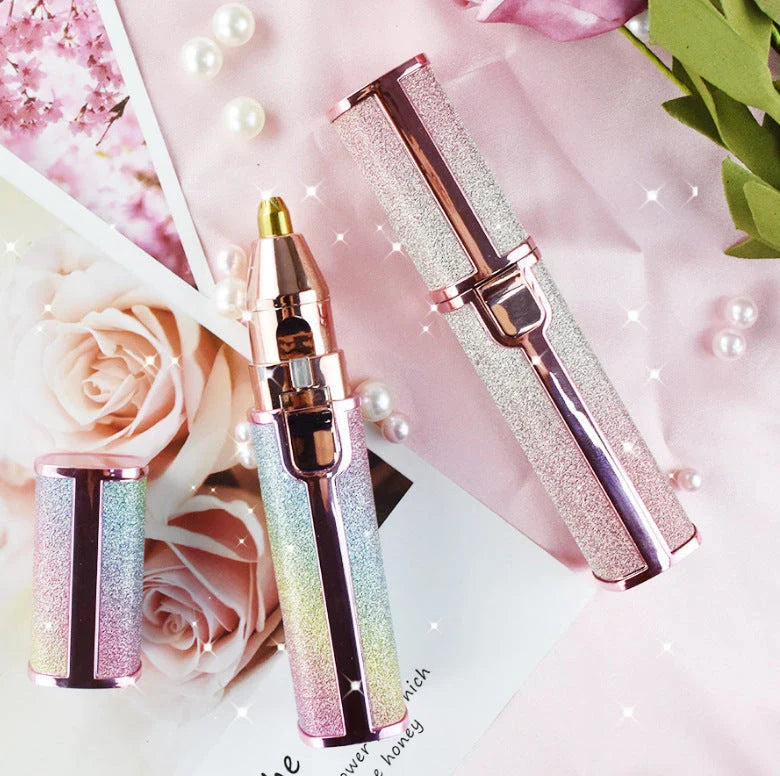 Lipstick-shaped electric eyebrow shaver with gold plated head
