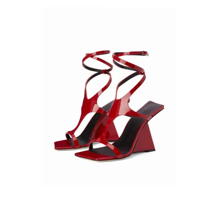 Women's black square toe high heel sandals with a 9.5cm block heel and button fastening.