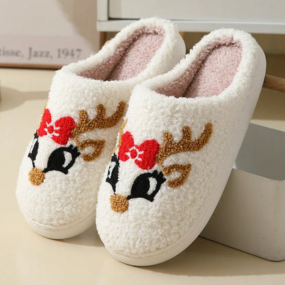 Cozy Christmas home slippers with festive designs, including Santa Claus, Moose, and Gingerbread Man patterns