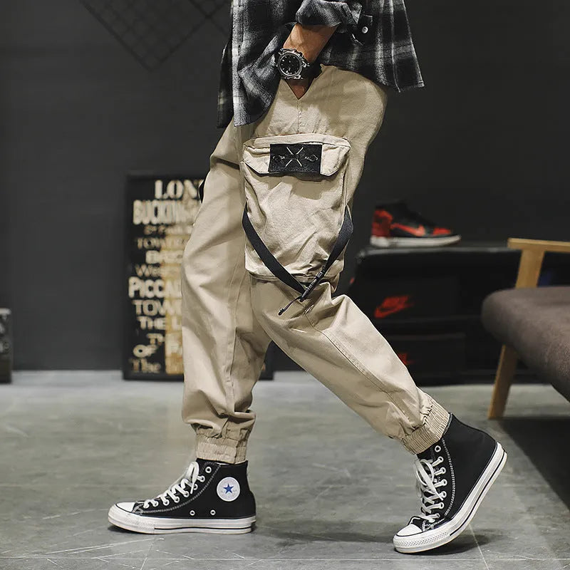 Men's casual cotton cargo pants in black with multiple pockets, available in Asian sizes S to XL