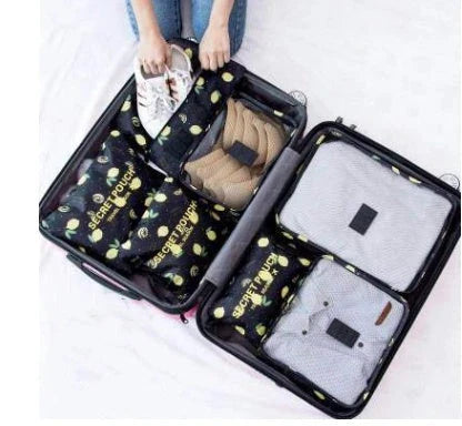 Durable waterproof packing cubes in various colors for organized, efficient travel