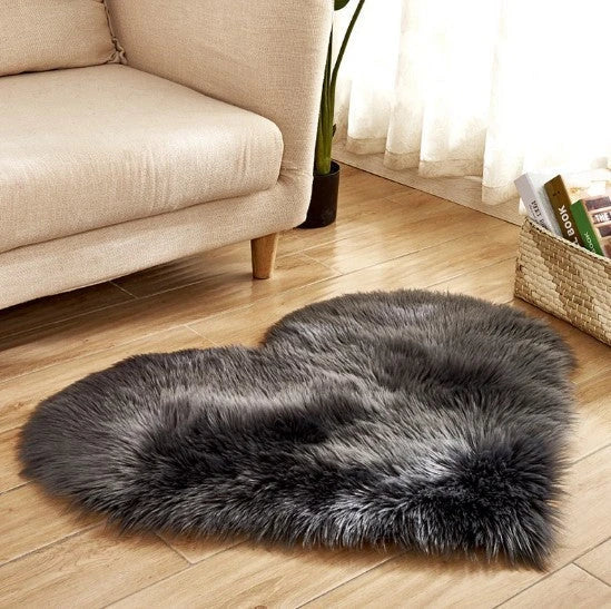 Soft, plush heart-shaped rug in various colors and sizes for comfortable home decor