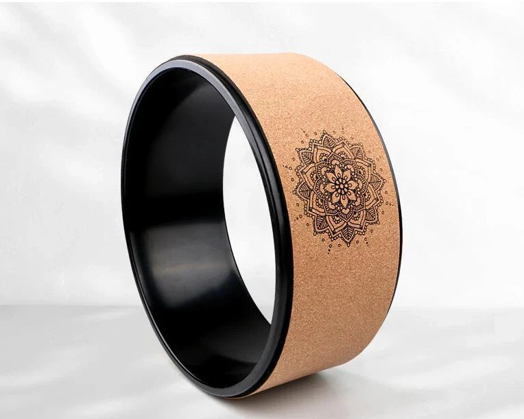 Green yoga wheel with 33cm diameter and 20mm thickness for spinal flexibility exercises