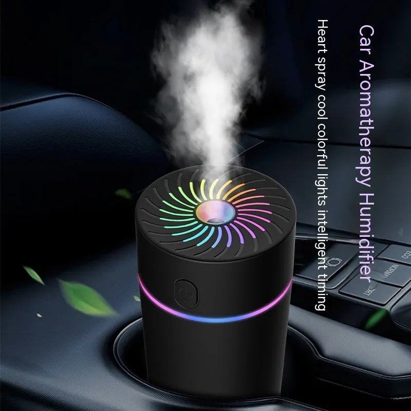 Compact white car USB humidifier with aromatherapy function placed on a car dashboard.