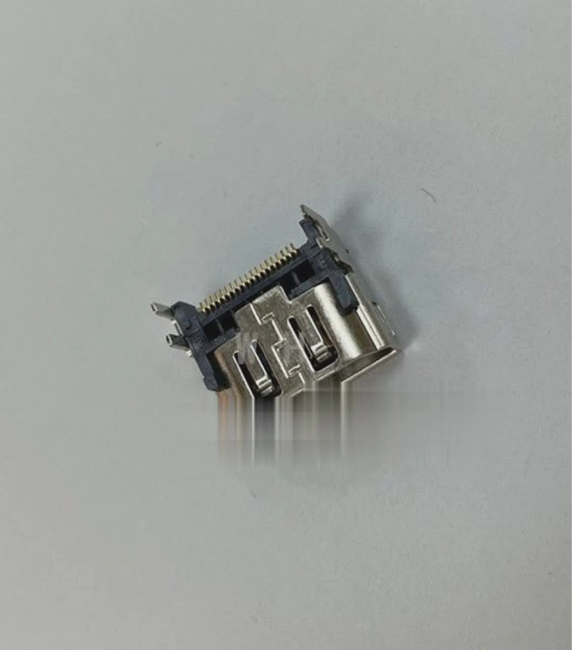 Silver HDMI interface host socket for motherboard mounting and repair.