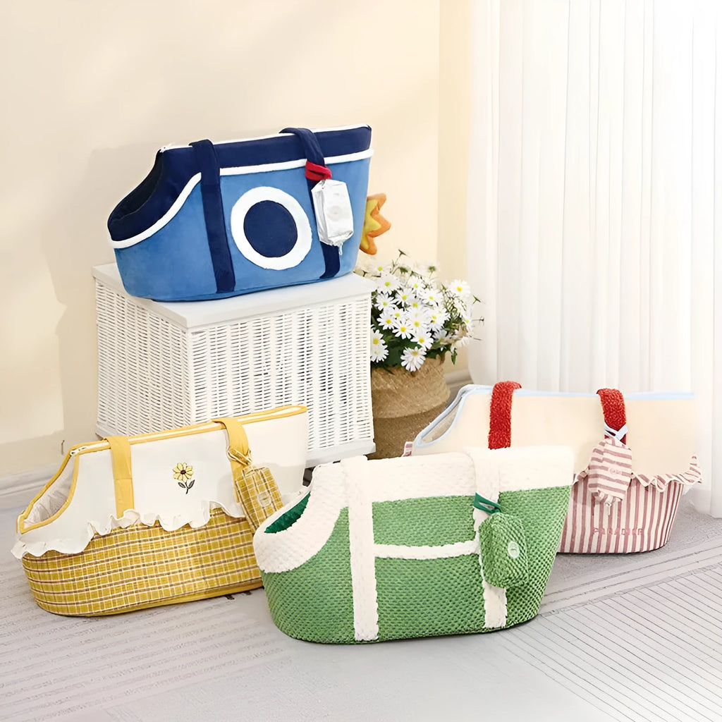 Shoulder cat bag with cartoon pattern in three colour options for small pet transport