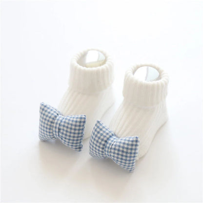 Cotton baby socks in various designs for newborns to 3-month-olds