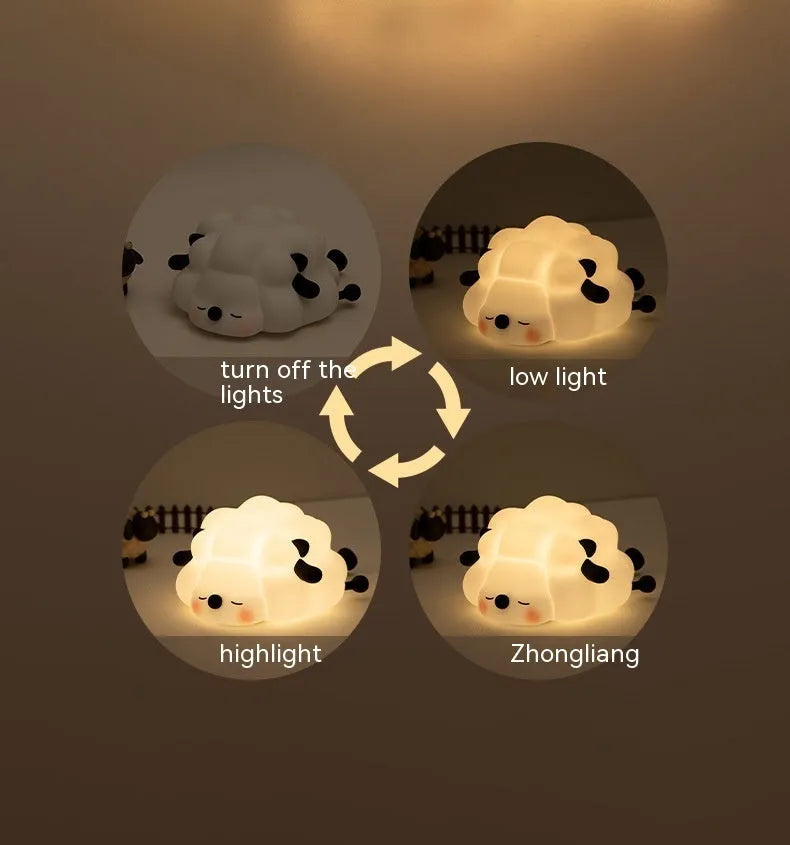 Cute silicone night light sheep cartoon bedroom lamp with warm light, rechargeable, on a bedside table