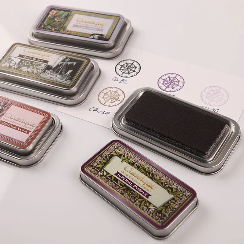 Rectangular stamp pad with oily ink for rubber stamps in five colour options