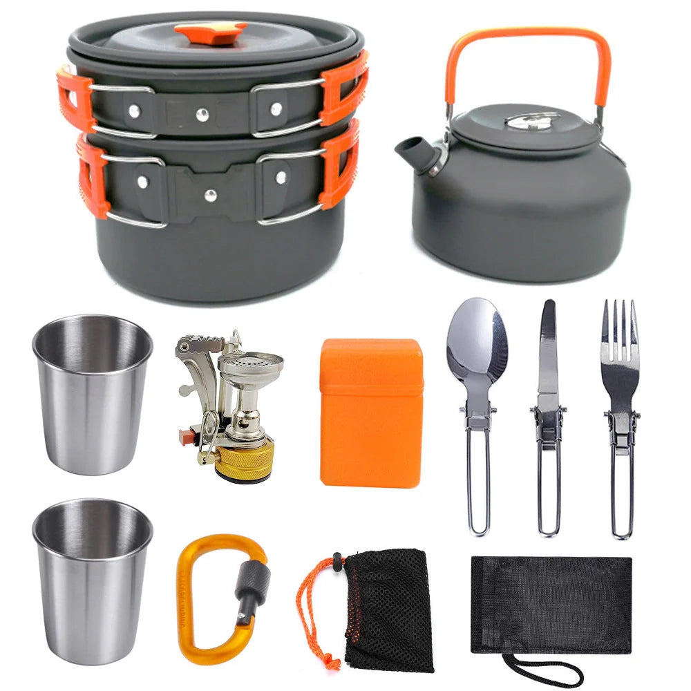 Aluminum camping cookware set with pots, pans, and utensils for outdoor cooking