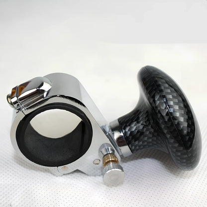 Adjustable stainless steel steering wheel booster in black, fitting up to 32mm thick rims for cars