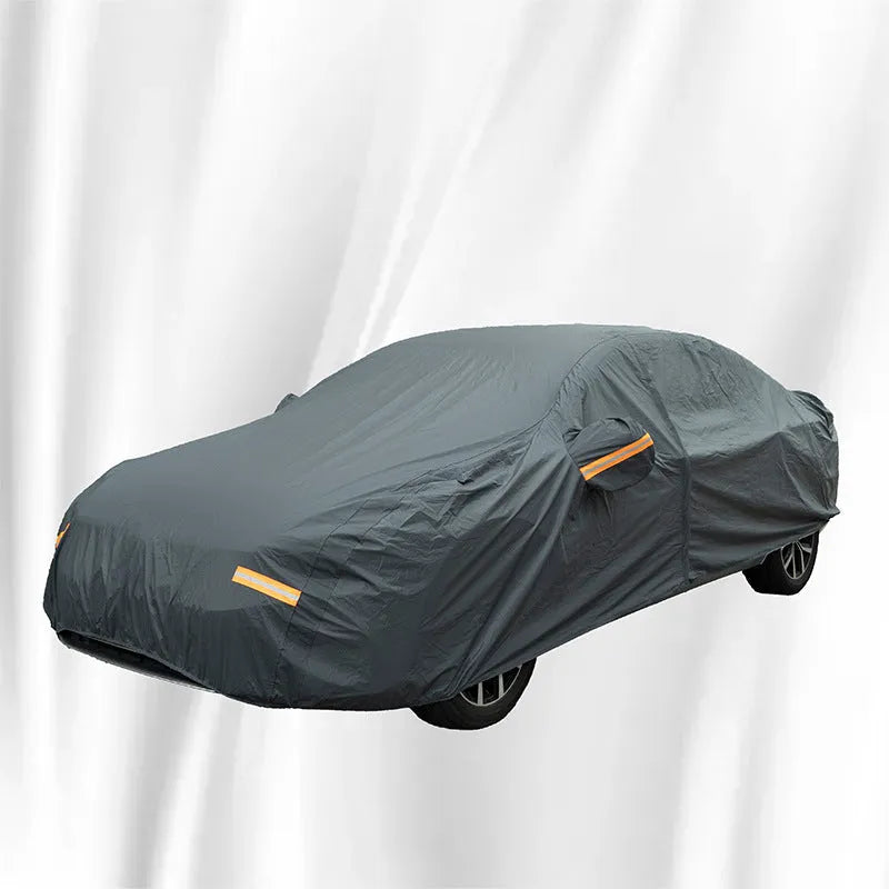 Grey PVC car cover for Volkswagen vehicles showing rainproof and sun protection features