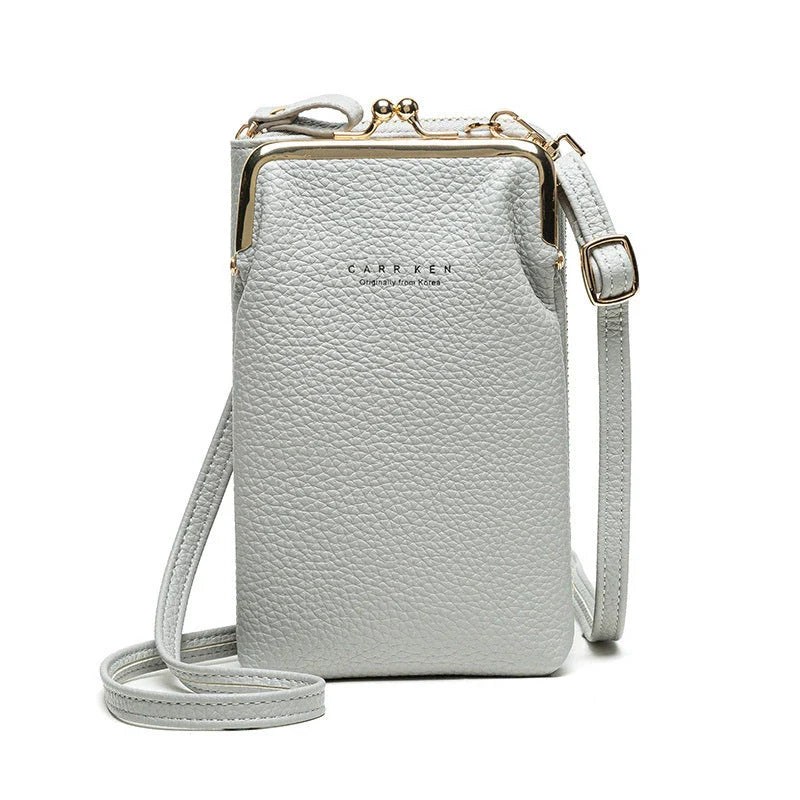 Stylish lychee pattern shoulder bag with a spacious interior and comfortable strap for everyday use