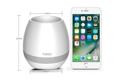 Touch-sensitive music vase desktop audio in pink, blue, and white