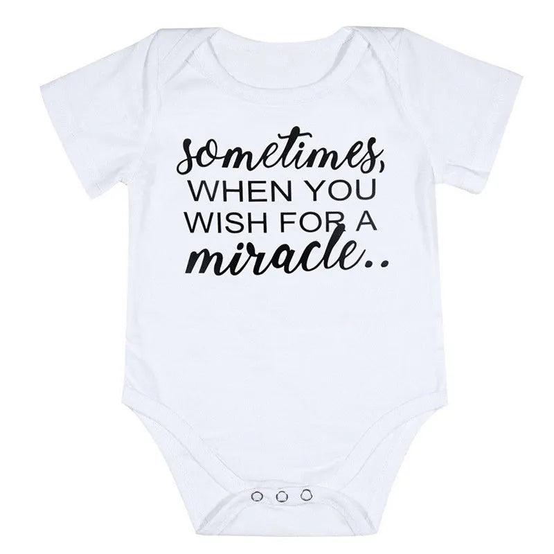 White baby jumpsuit romper with elasticated fit for infants and toddlers, sizes S to 3XL