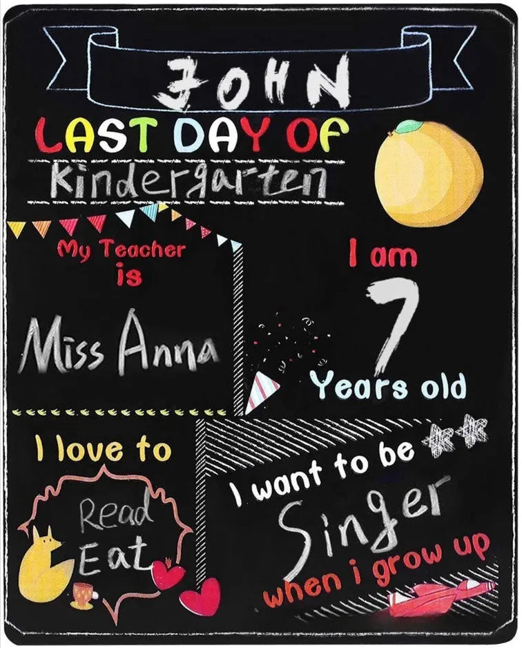 Black wooden First Day of School sign with white chalkboard text, measuring 25.5 by 30 centimetres.