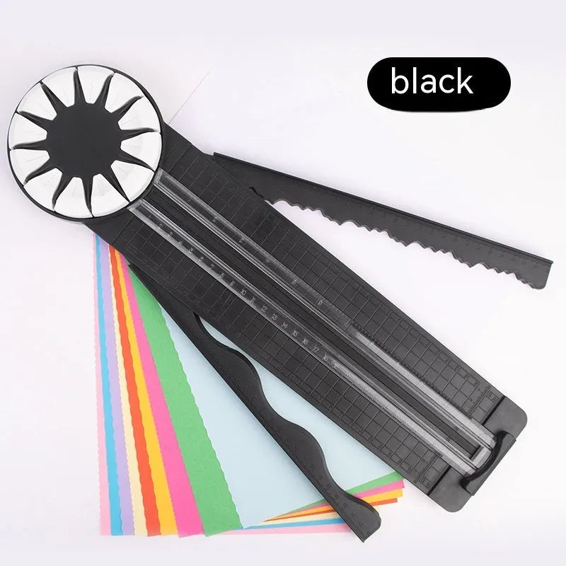 Pink and black 12-in-1 plastic dotted paper cutter on a white background.