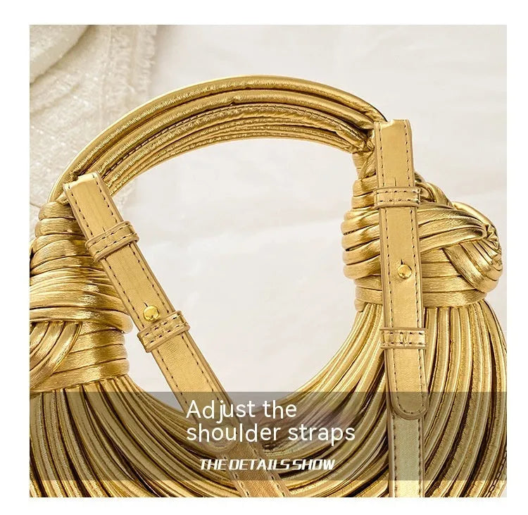 Instafamous Metal Noodles Underarm Bag with shiny metallic surface, chain detail, in gold colour