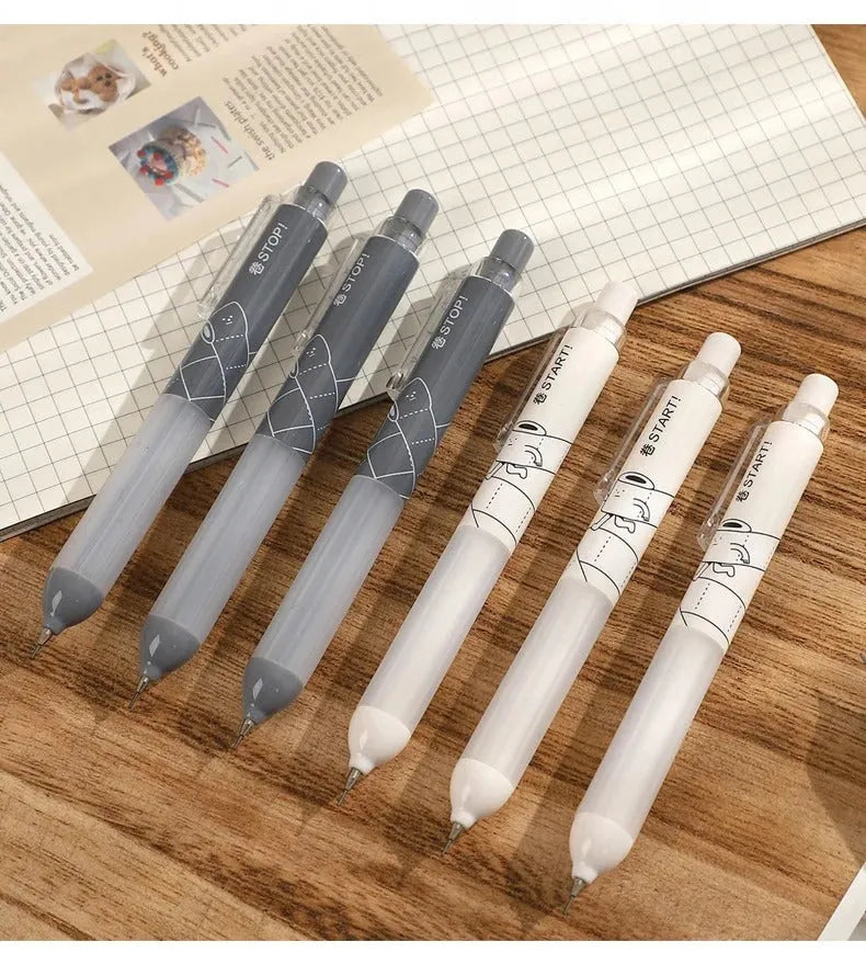 Black and white 0.5mm mechanical pencils with a soft grip section and push-button top.