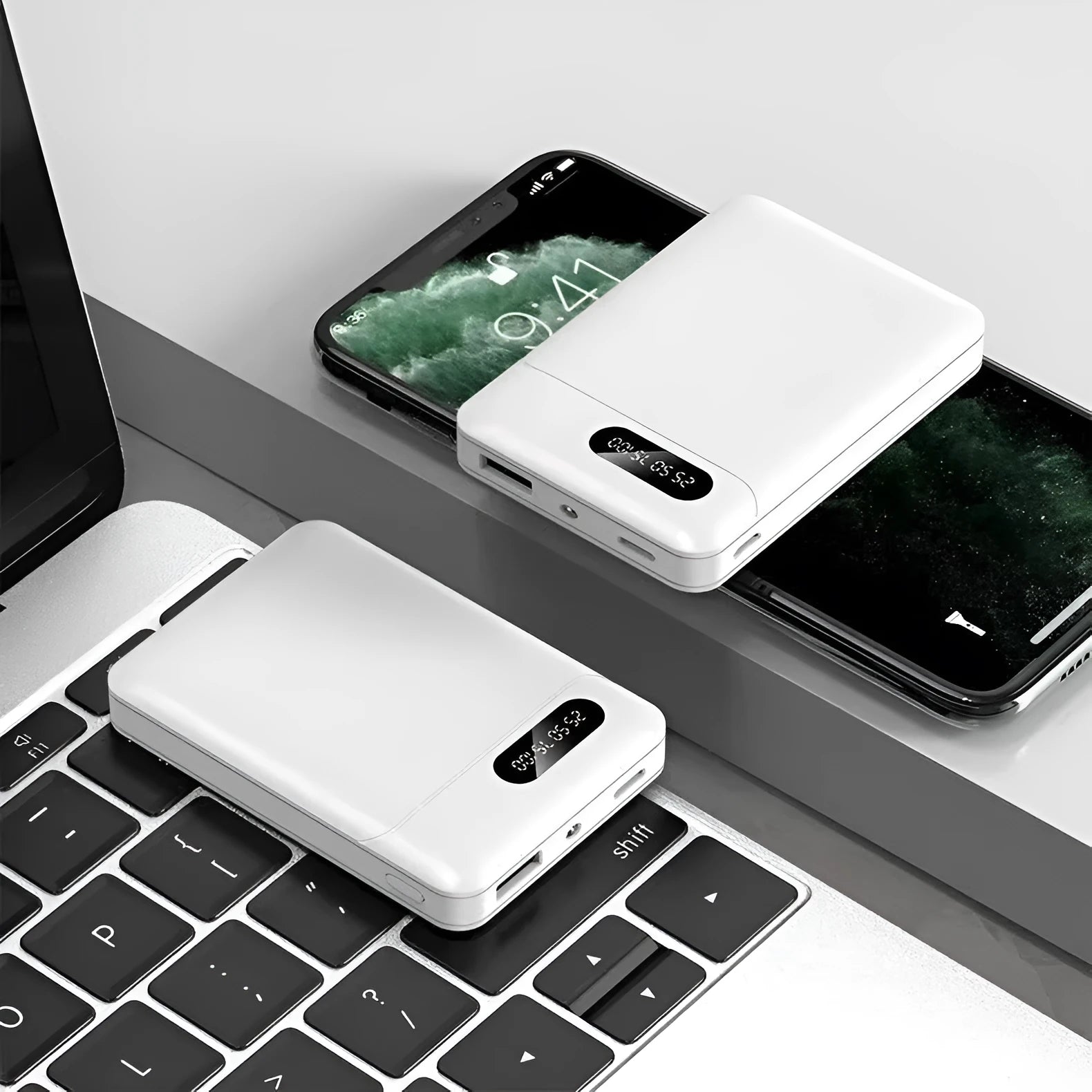 White and black portable power bank with multiple USB ports showing 10000mAh capacity label