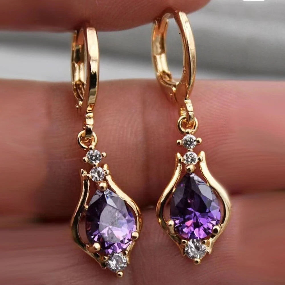 Purple zircon drop-shaped earrings with geometric design and inlaid stones
