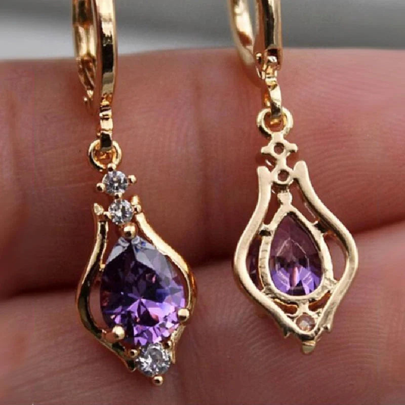 Purple zircon drop-shaped earrings with geometric design and inlaid stones