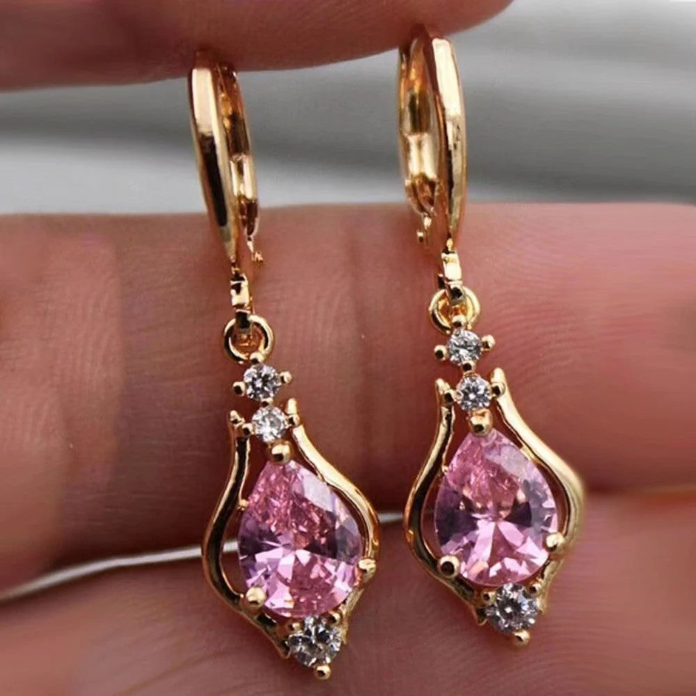 Purple zircon drop-shaped earrings with geometric design and inlaid stones