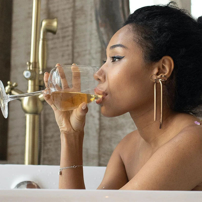 Hypoallergenic 18k gold plated herringbone bow earrings with tassel tails