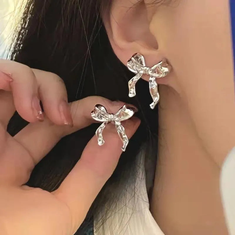 Gold bow earrings simple style alloy with electroplated finish