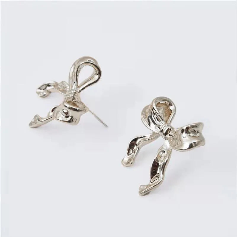 Gold bow earrings simple style alloy with electroplated finish