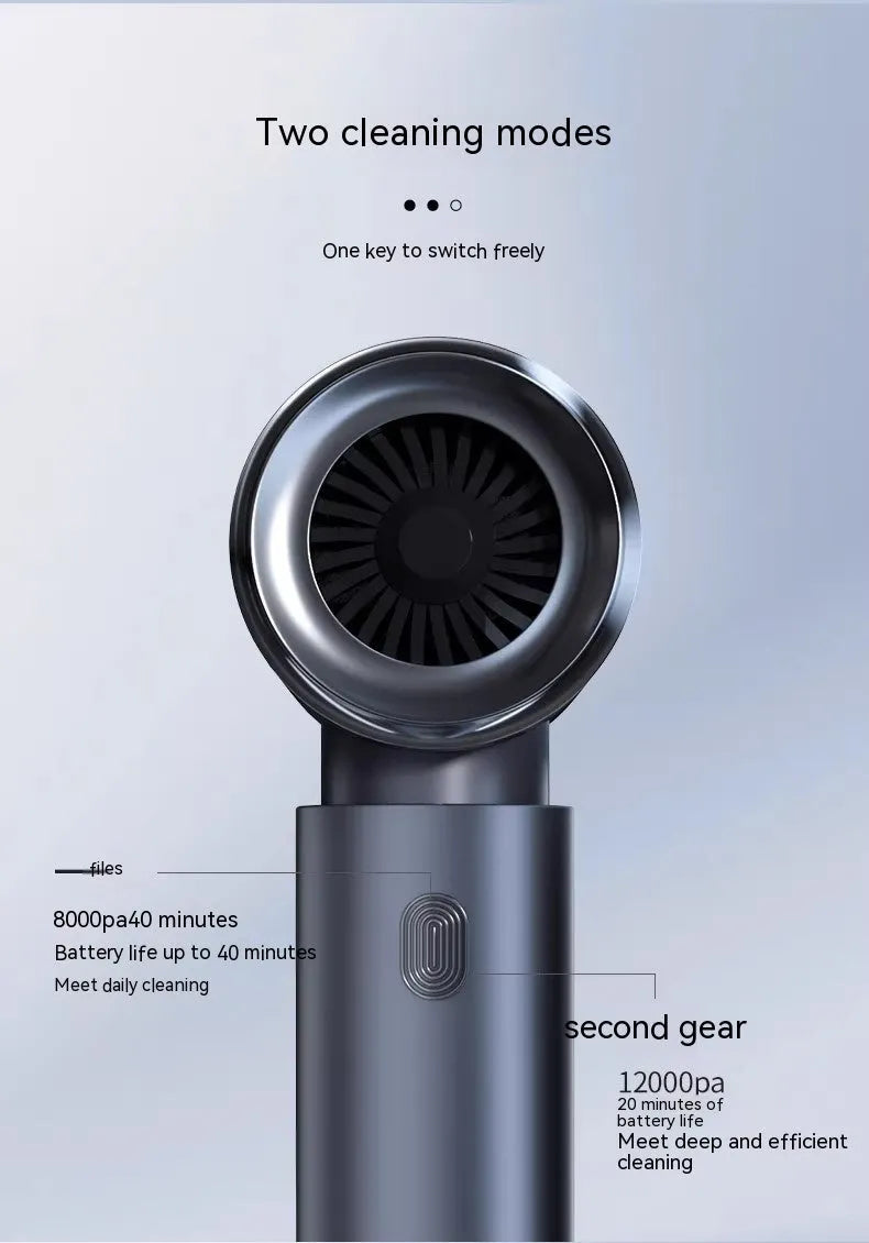 Handheld car vacuum cleaner in space gray with strong suction nozzle for vehicle interior cleaning