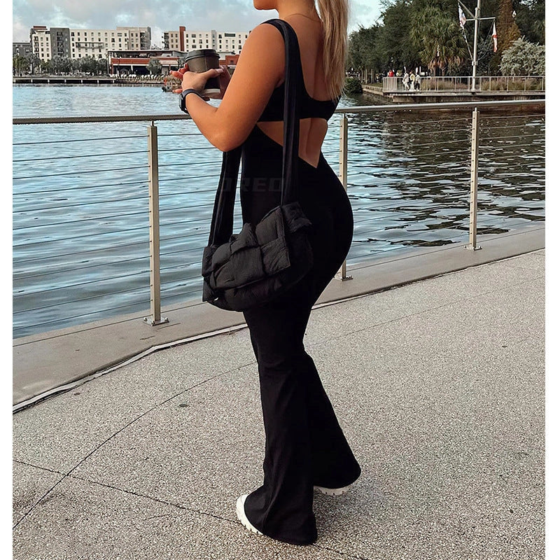 Slim fit hip raise jumpsuit in black and brown for yoga and exercise with backless design