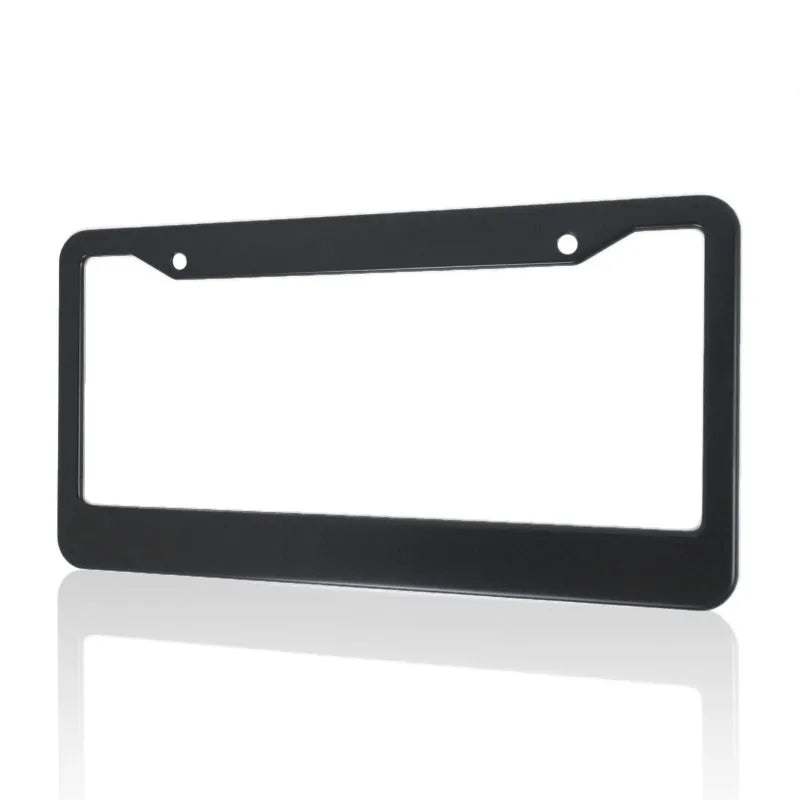 Minimalist black aluminium licence plate frame with square holes for an American Standard car