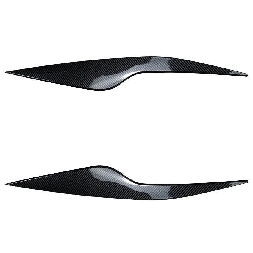Pair of ABS plastic headlight eyebrow stickers for Ford Focus in carbon fibre pattern finish