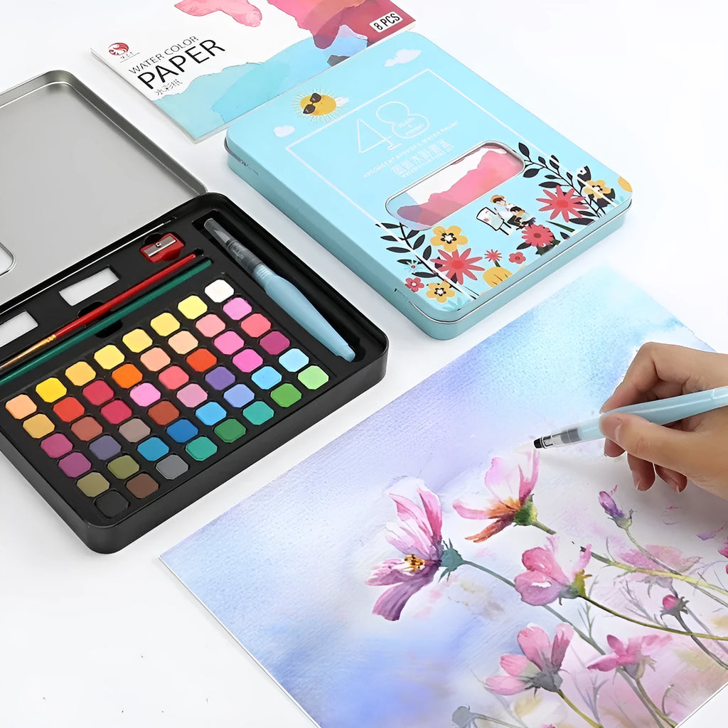48 colour solid watercolour paint set showing Black Knight, Girl Pink and Sunshine Blue pans in plastic box