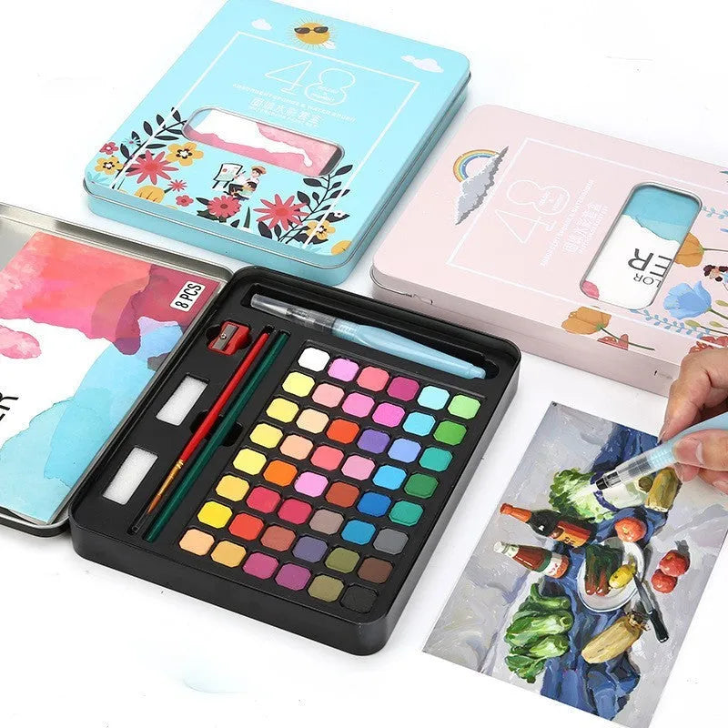 48 colour solid watercolour paint set showing Black Knight, Girl Pink and Sunshine Blue pans in plastic box