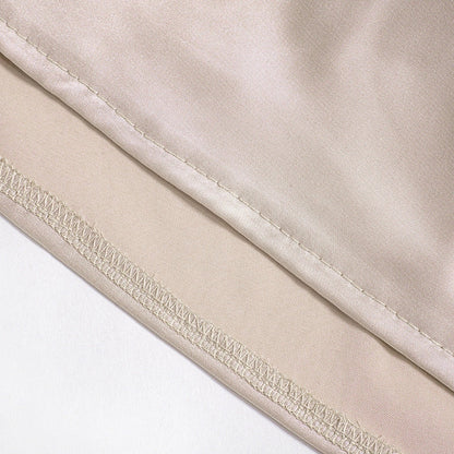 One-shoulder sleeveless mini dress in various colours, high-waisted skirt, backless design