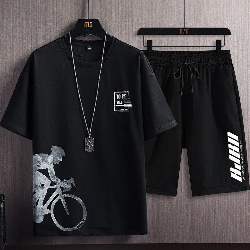 Printed slim fit plus size sports two-piece set in bike black suit, top and pants on display