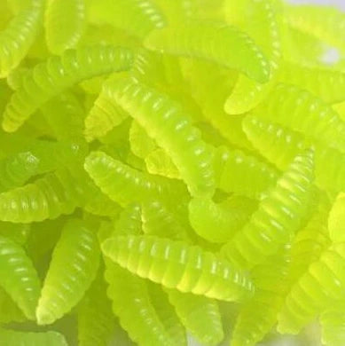 50 artificial maggot fishing lures showing segmented body design and colour variations