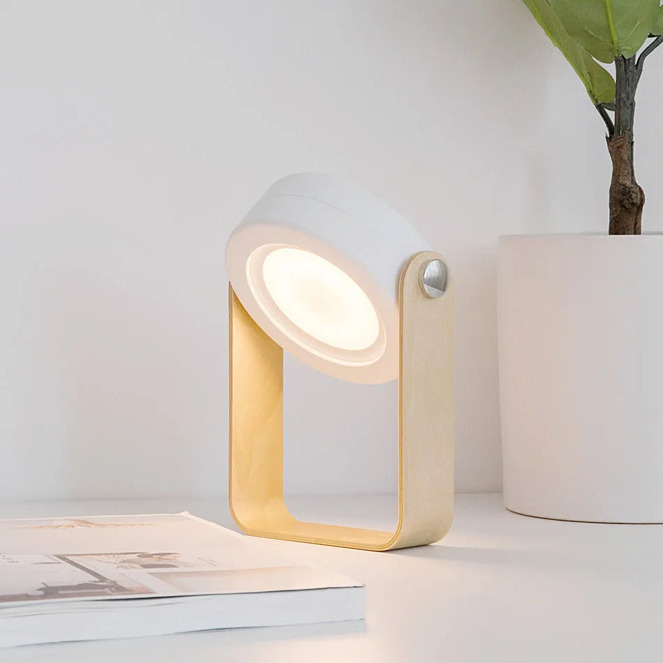 Foldable touch dimmable LED reading lamp in white, showing table lamp and lantern modes.