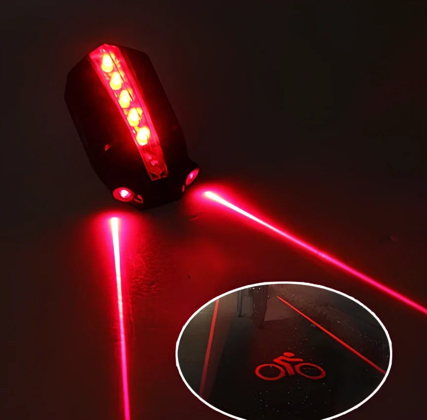 Black and red bicycle laser taillight with five LEDs and projection, 8.5x5x3.5 cm, mounted on bike frame