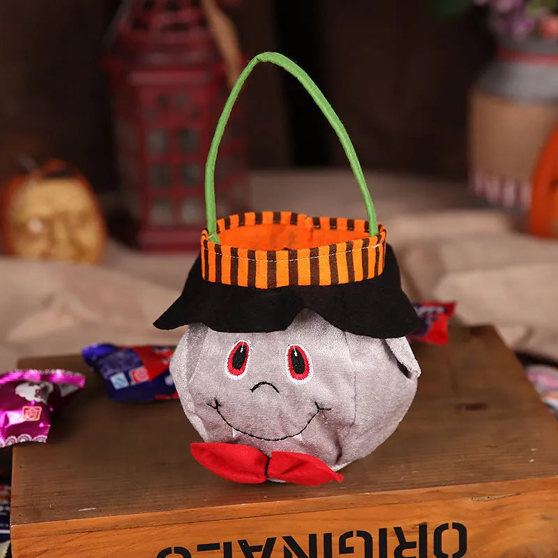 Halloween candy bag in pumpkin, witch, vampire, or blackcat design measuring 16cm square