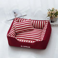 Navy striped washable dog kennel mat with a removable cover and a matching mini pillow.