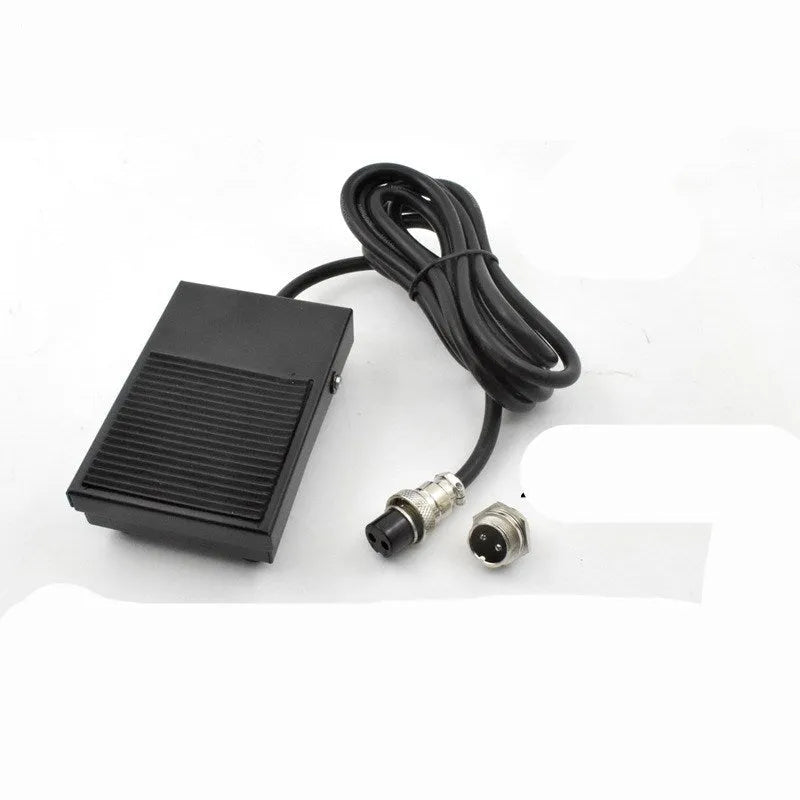 Metal welding foot switch pedal with black rubber top and a 1.8 metre long grey cable attached