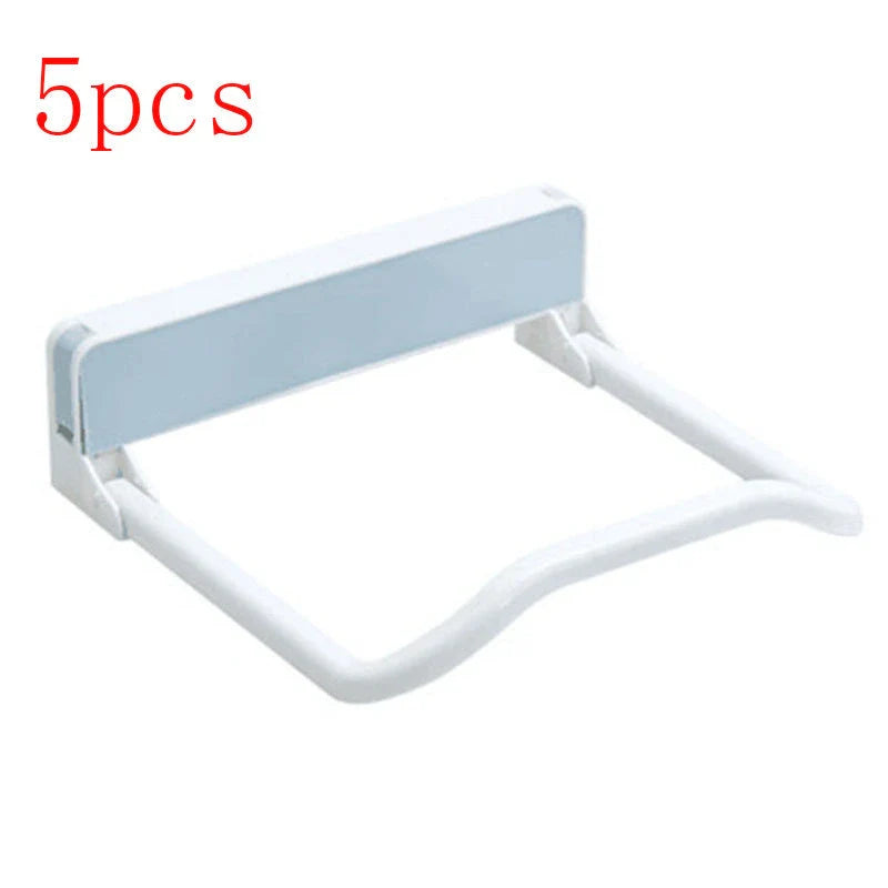 Folding storage rack with non-marking stickers in pink, blue, and grey