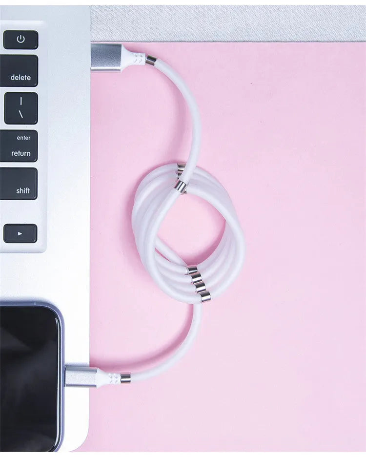 Black magnetic charging cable with Apple, Android, and Type-C compatibility showing aluminium alloy joints