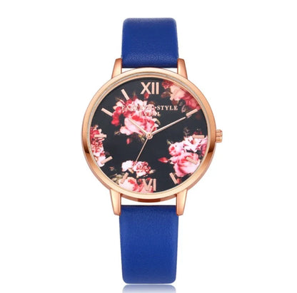 Rose gold women's watch with leather strap and love heart design